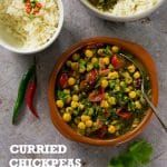 These speedy curried chickpeas and spinach make an easy but flavour-packed weeknight supper. Service with rice or nan breads. #vegan #plantbased #veganfood #vegetarian